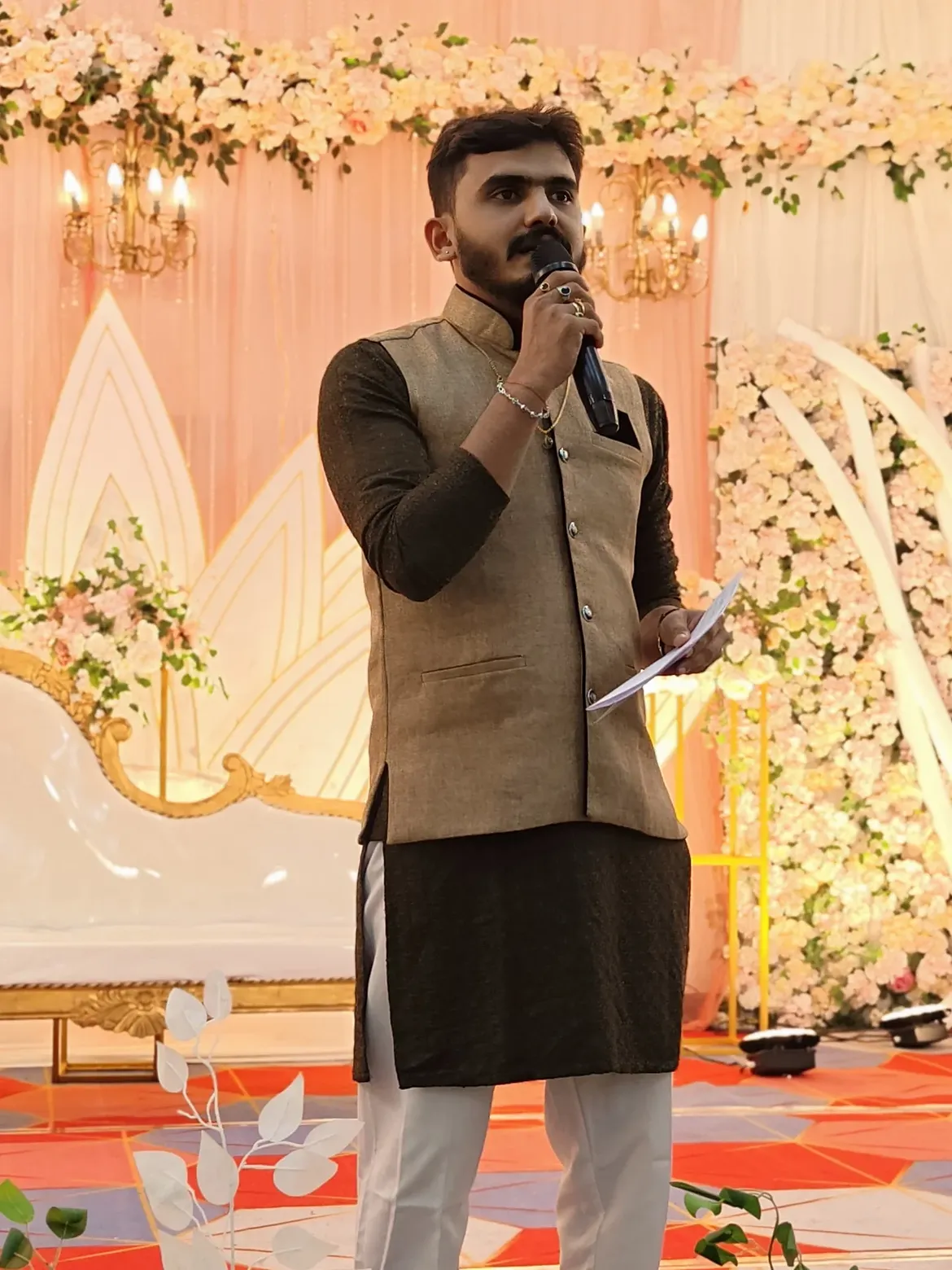 Param Bharadwaj anchoring a luxury event
